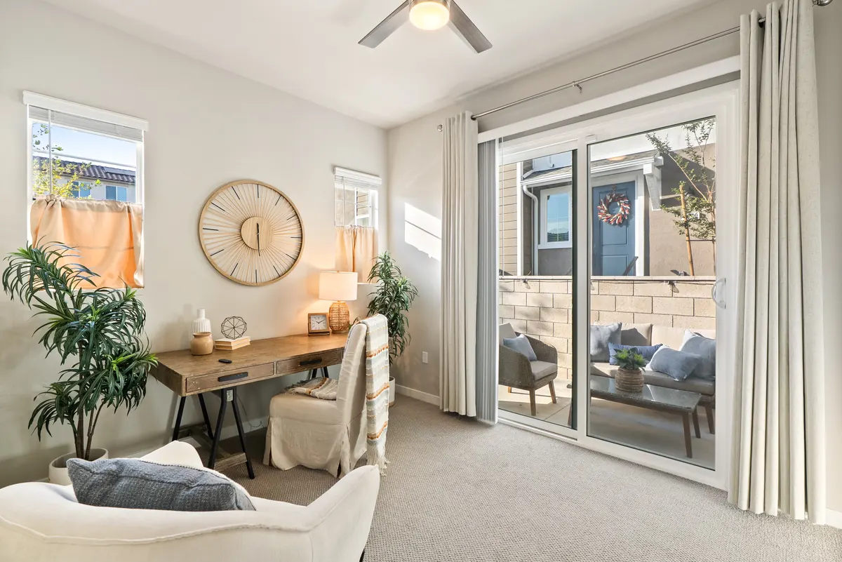 Staged office opening to a private patio in a Cabrilla II home at Ponte Vista