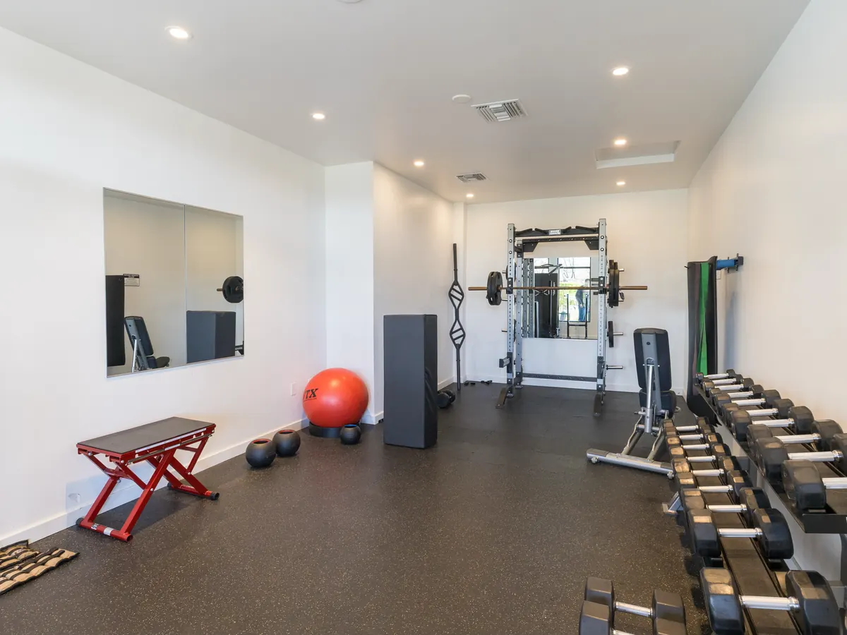 The community fitness center with cardio and strength equipment at Ponte Vista in San Pedro
