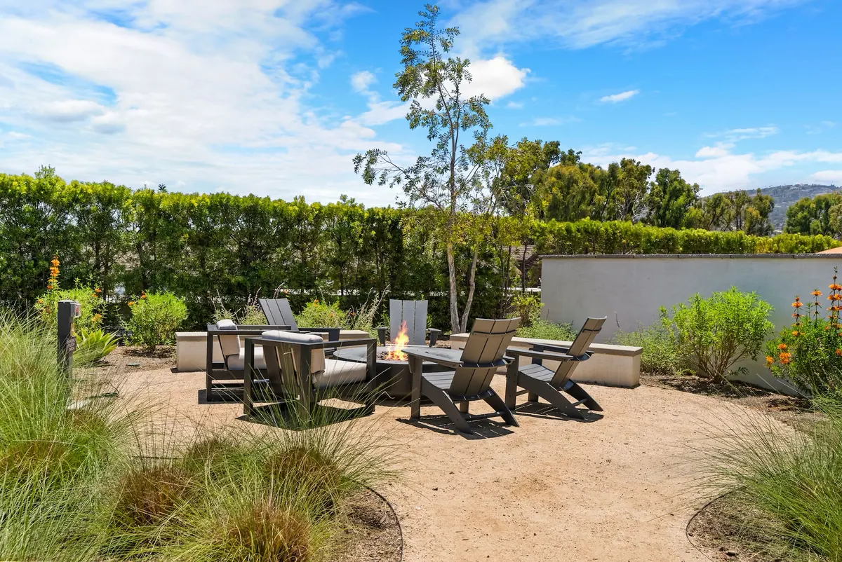 The community fire pit with lounge seating at Ponte Vista in San Pedro