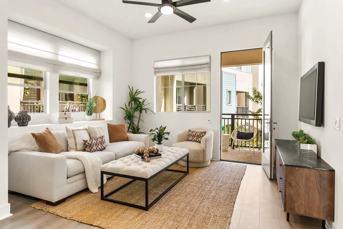 Living room opening to the deck in Harbor Pointe at Ponte Vista in San Pedro